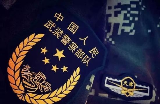 武警部队明日起统一佩戴新式标志服饰(图)
